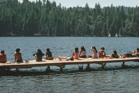 Campers sitting on the dock (ddr-densho-336-1106)