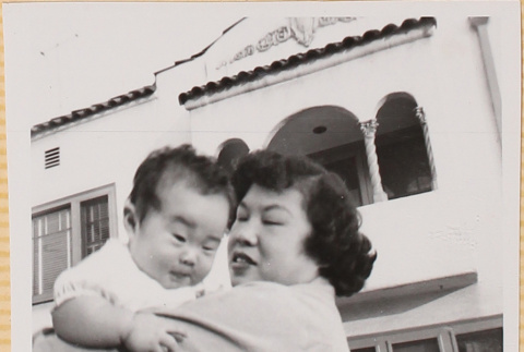Yoshiko Shiomi holding Susan Shiomi (ddr-densho-522-144)