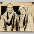 Douglas Fairbanks and Mary Pickford wearing leis (ddr-njpa-1-1136)