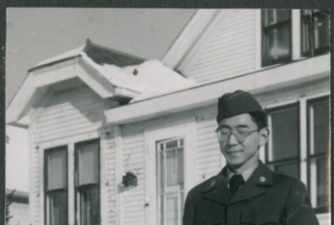 Man in uniform in snow (ddr-densho-523-235)
