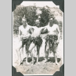 Three men wearing seaweed skirts (ddr-ajah-2-180)