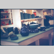 Display of enamelware bowls and pots, lacquerware ashtrays (ddr-densho-426-323)