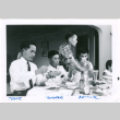 Men sitting at a table eating (ddr-densho-430-212)