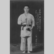 Japanese American with judo trophy (ddr-densho-109-112)