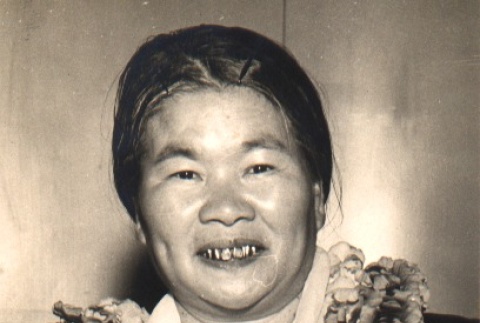 Sayo Kitamura wearing leis (ddr-njpa-4-436)