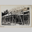 Construction on roof of a building (ddr-densho-433-695)