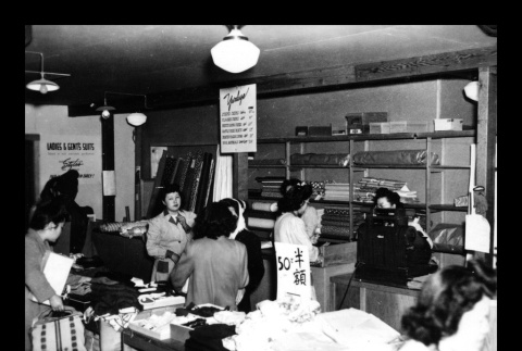 Fabric section of Dry Goods Department, Amache Co-op (ddr-csujad-55-1576)