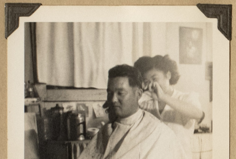 Roy getting a haircut (ddr-densho-542-522)