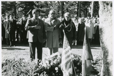 Three standing at memorial service (ddr-densho-1007-268)