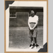 Young woman outside barracks (ddr-densho-542-242)