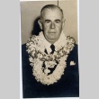 A man wearing leis (ddr-njpa-1-1247)