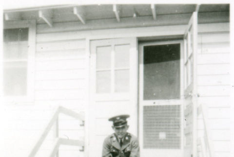 Officer on stoop (ddr-densho-1007-600)