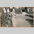 Woman in trenchcoat (ddr-densho-468-312)