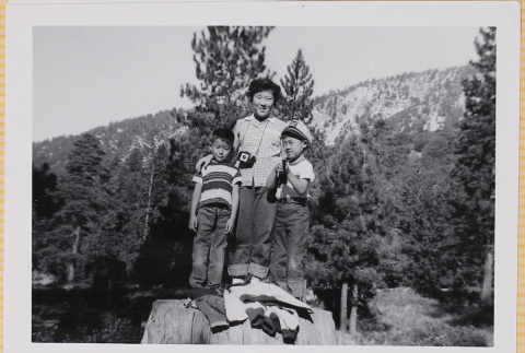 Yoshiko Shiomi with two boys (ddr-densho-522-306)