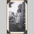 Woman posing next to a tree (ddr-densho-542-332)