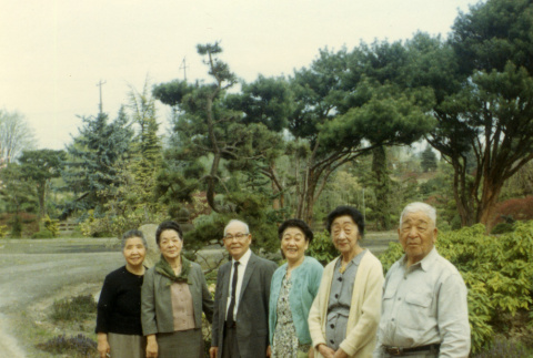 Ko Kubota on left, Fujitaro Kubota on right, on Heart Bridge with friends (ddr-densho-354-553)
