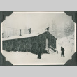 Men shoveling snow from barracks roof (ddr-ajah-2-290)