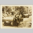 Indonesian soldiers riding on small tanks (ddr-njpa-13-1142)