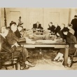Franklin D. Roosevelt seated at his desk with others (ddr-njpa-1-1502)