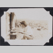 Woman lighting a small stove (ddr-densho-467-27)