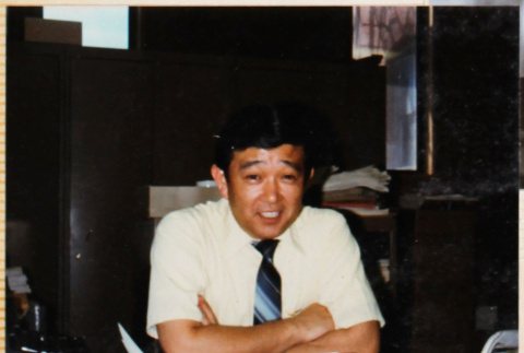 Man sitting at desk (ddr-densho-426-1350)