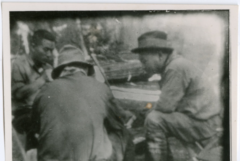 Three men sitting (ddr-densho-377-1640)