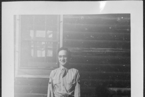 Man standing outside barracks (ddr-densho-434-426)
