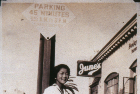 Woman on sidewalk (ddr-densho-1007-617)