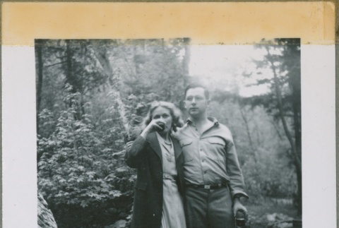 A couple drinking in the woods (ddr-densho-338-237)