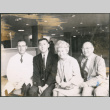 Agnes and Chester Sakura with one of their sons and another man (ddr-densho-523-361)