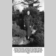 Chiyoko Kono standing in garden (ddr-ajah-6-270)