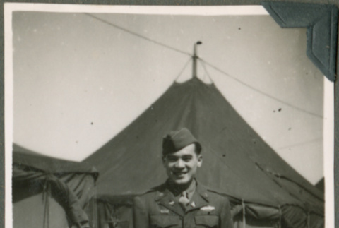 Soldier in front of tents (ddr-densho-201-531)
