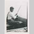 Man fishing in boat (ddr-densho-326-11)