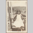 A young girl standing on a deck (ddr-densho-278-87)