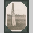 Man leaning on post (ddr-densho-471-99)