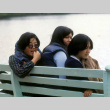 Eileen Yemoto, Patti Iseke and Mary Eijima sitting on a bench (ddr-densho-336-892)