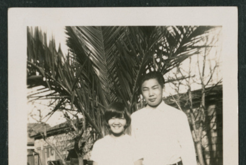 two kids next to palm (ddr-densho-378-456)