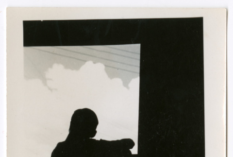 Silhouette of a man looking outside (ddr-densho-475-284)