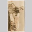 Man standing by car (ddr-densho-426-2149)