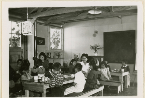Children eating in a classroom (ddr-densho-37-1061)