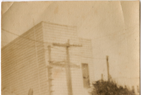 Man doing handstand on box (ddr-densho-426-1417)