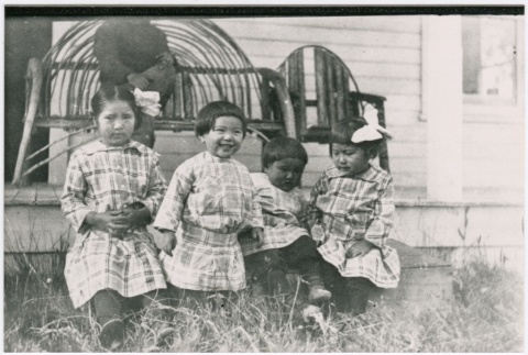 Four children in front of a porch (ddr-densho-353-413)