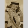 Bette Davis posing with leis (ddr-njpa-1-204)
