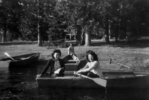 Mollie Abe and Lilyan Nagata in a row boat (ddr-densho-336-35)