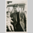 Henri and Norman Takahashi by car (ddr-densho-426-1050)