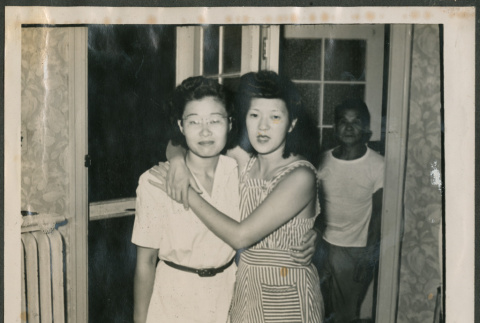 Two women, with man standing in background (ddr-densho-316-410)