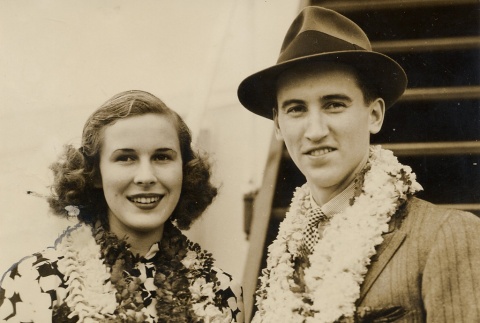 A couple wearing leis on a ship (ddr-njpa-1-411)