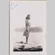 Woman standing alongside river (ddr-densho-464-127)