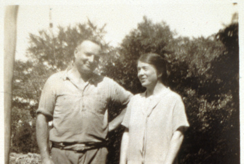 Smiling couple in yard (ddr-densho-1007-594)