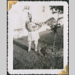 Man dressed in mop wig and skirt (ddr-densho-434-375)